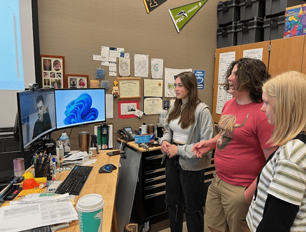 Students on a video call with a material specialist 